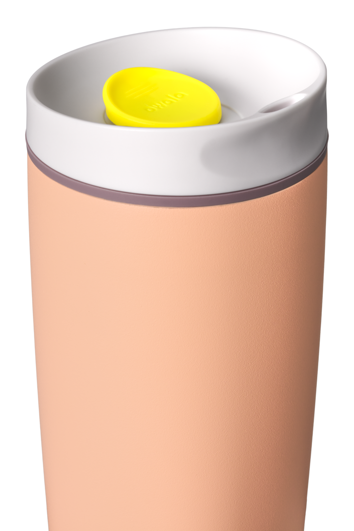 Owala SmoothSip Slider 20oz in Peachy Keen, close-up of lid area showing peach-orange body, white lid, and yellow slider button